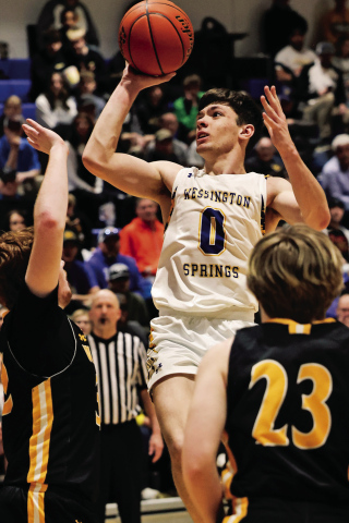 Karter Mebius soars to the hoop during Region 2B semifinal action Saturday, March 8, 2025 at the Dakota State University Fieldhouse in Madison, SD. The Spartans defeated the Warbirds 61-37, punching their ticket to SoDak 16. KRISTI HINE / TRUE DAKOTAN