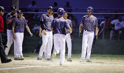 PHOTO COURTESY RODNEY HAAS/605 SPORTS Wessington Springs Owls celebrate as Blake Larson crosses home plate. Larson added a solo home run as part of a two-hit day during a district battle vs. Burke.