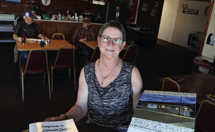 Carla Niemeyer is shown above at the Springs Inn Cafe which she owns and operates with husband Jon. Since last October, she’s been posting photos on the restaurant’s Facebook page that feature Jerauld County-area businesses, service providers and landmarks. Her project has generated a large and lively following locally and across the nation.