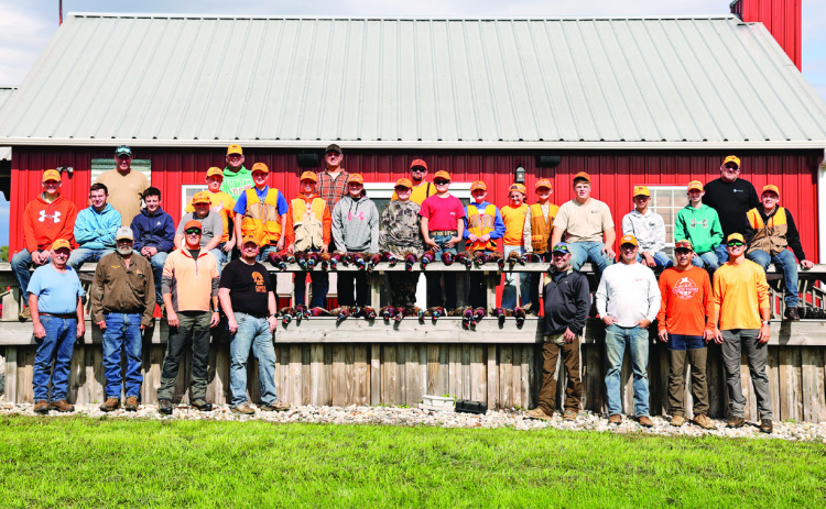 Young hunters gather with their mentors and Wessington Springs Pheasants Forever volunteers during the annual Youth Hunt held Oct. 3, 2026. Jason and Cristin Weber provided the hunting grounds, while the Mullett family provided the facilities pictured in the background. (KRISTI HINE / TRUE DAKOTAN)