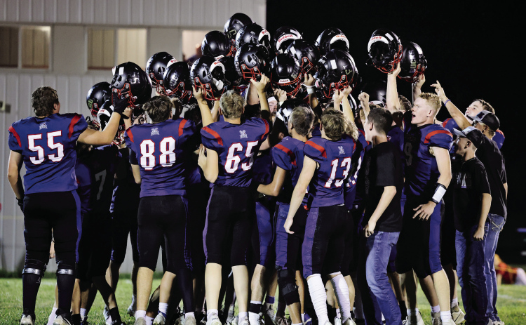 The Bucks celebrate a thrilling 13-6 homecoming win over Wagner.