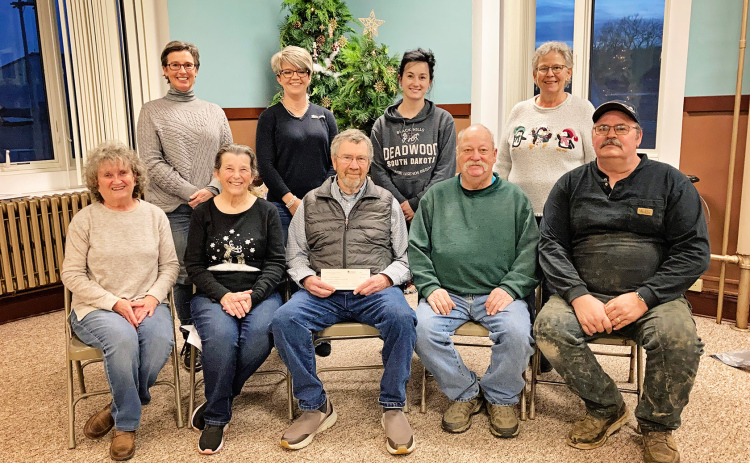 Back row, WSACF board members Gwyneth Dean-Witte Fastnacht, Kari Fagerhaug, Bethany Schimke and Laura Kieser. Front row representing the Dunham Historical Society are Patti Diedrich, Jean Ferguson, Mark Steichen, Darrell Deneke and Jerry Voorhees. CAM FAGERHAUG / TRUE DAKOTAN