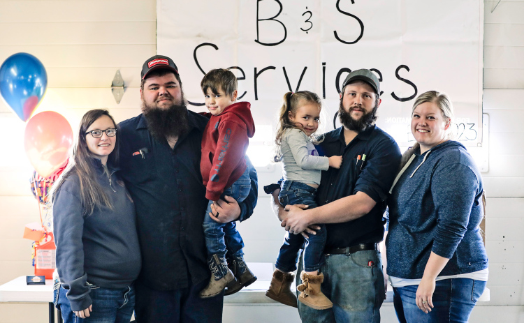 New B&S Services owners Aryan Schooler and Cody Barber are pictured above during their open house held Saturday. Left to right: Shelby, Aryan and Westin Schooler; Chloe, Cody and Casey Barber.