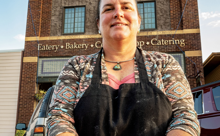 Heather Larson, owner of Sweet Grass in Wessington Springs, offers a special donut covered in Fruity Pebbles cereal.