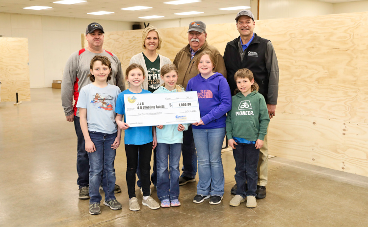 Central Electric Cooperative presented a $1,000 Operation Round-Up grant to J&B 4-H Shooting Sports on April 10. Shown left to right, back row: Aaron Roesler, J&B 4-H Shooting Sports Treasurer; Amber Kolousek, Operation Round Up Board Member; Mark Reindl, Central Electric Board Member; Ken Schlimgen, Central Electric Cooperative General Manager. Front row, left to right: J&B Shooting Sports 4-Hers Myles Tanke, Torree Olinger, Crawleigh Reiner, Quinn Everson and Kershaw Reiner.