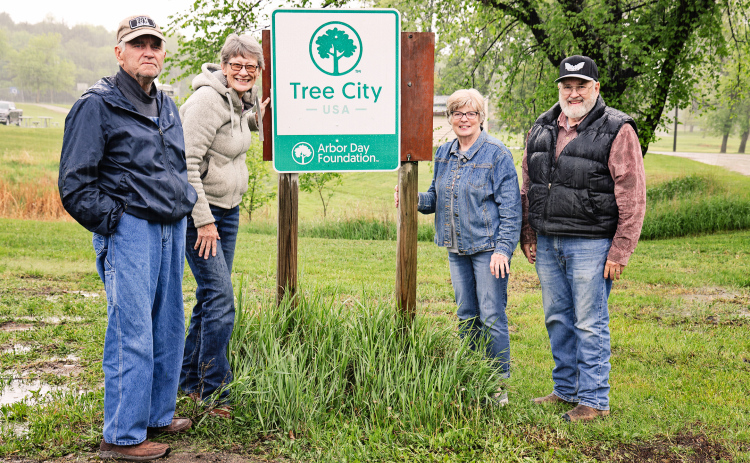 Members of the City of Wessington Springs’ volunteer Tree Committee and Park Board are pictured with the recently-installed Arbor Day Foundation sign after the city received its designation as a Tree City USA. Left to right are: Jim Headley, Kathy Voorhees, Terri Mebius and Dr. Tom Dean.