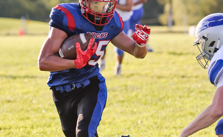 KRISTI HINE / TRUE DAKOTAN Hayes Havlik added three catches for 76 yards, including a touchdown during Friday night’s 13-12 Bucks victory over Bridgewater-Emery-Ethan. Havlik suffered a catastrophic ankle and lower leg injury during the game and later underwent surgery.