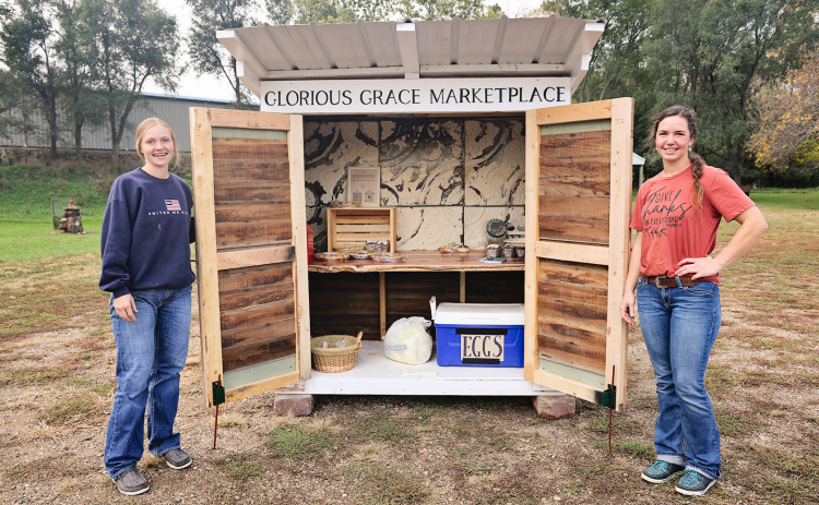 Sisters Ruthe Lindvall (left) and Cheri Lopez, both of Wessington Springs, opened their self-service bakery stand, Glorious Grace Marketplace, on October 17. KRISTI HINE / TRUE DAKOTAN