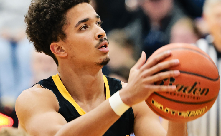 Caleb Richmond puts up shots as Wolsey-Wessington battled through a busy December stretch.