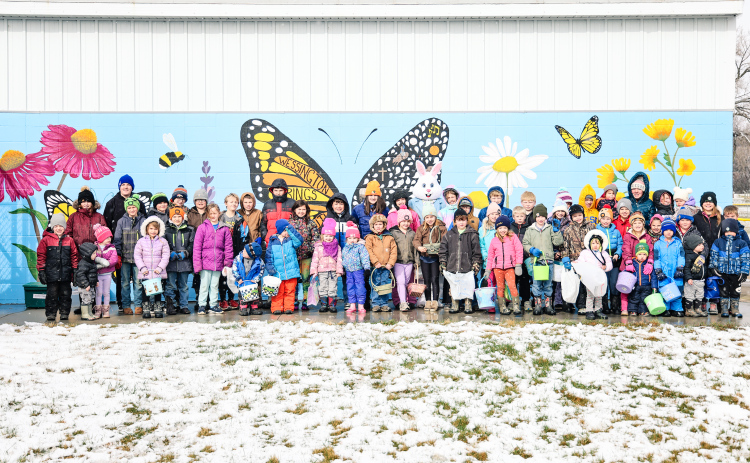 Participants gather for the traditional group photo, a longtime True Dakotan Easter egg hunt tradition spanning decades.