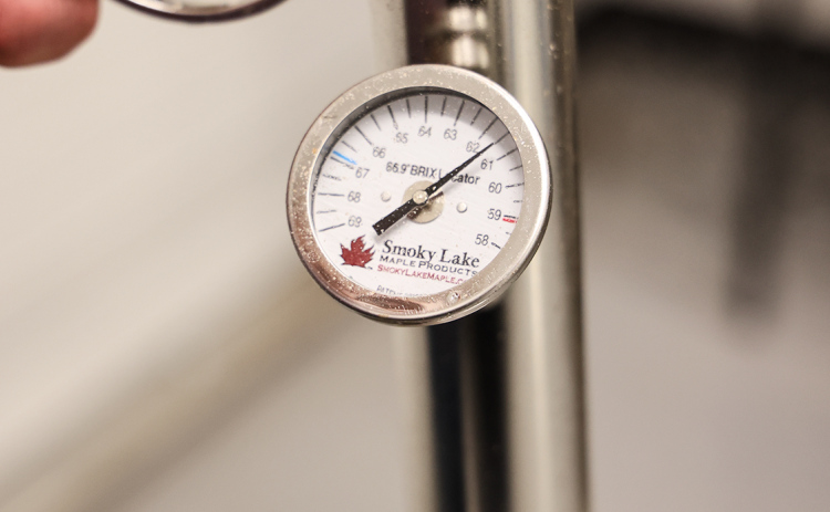 Using a Murphy cup and hydrometer, students worked toward the ideal 66.9% sugar concentration required for finished syrup.