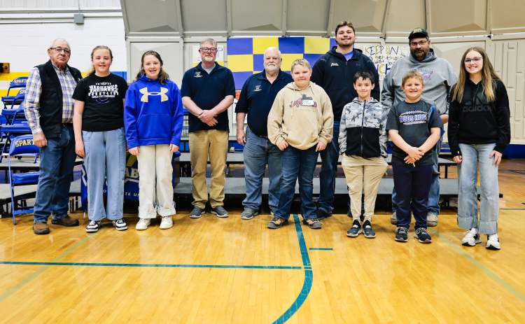 Pictured, from left, are local Shriner Roger Dwyer, Maxon Finn, Quinn Everson, Shriners Chris Schimke and Fred Krohmer, Principal-for-an-Hour Wyatt Arhart, Quinten Christensen, Adam Knippling, Hayes Cashman, Shriner Wade Christensen and Kenzie Bartel. (KRISTI HINE / TRUE DAKOTAN)