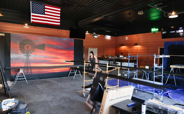 Freshly painted trim dries on sawhorses inside County Line Bar and Bites as renovation work continues on the future bar and restaurant in Wessington. Owners say only a handful of finishing touches remain before the new community gathering spot opens later this summer.