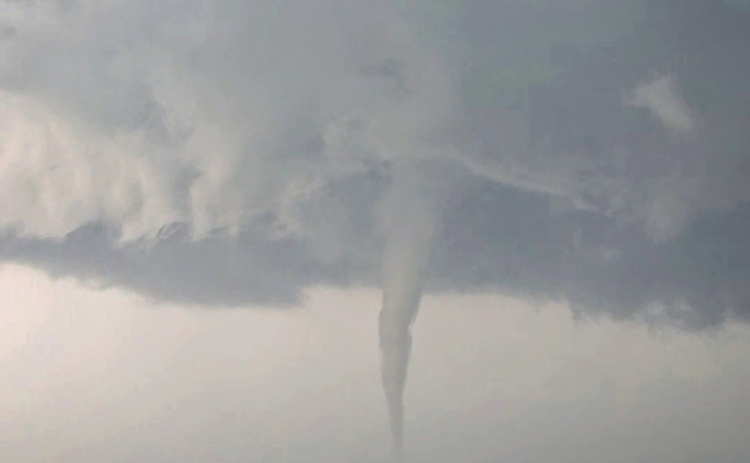 A tornado with visible rotation touches down about 13 miles west of Wessington Springs along Highway 34 on Thursday afternoon, July 2. The tornado prompted a warning for Jerauld and Buffalo counties as first responders and storm spotters monitored the storm’s path. Despite heavy rain, hail and strong winds, no property damage was reported in Jerauld County. (PHOTO COURTESY JERAULD COUNTY SHERIFF JASON WEBER)
