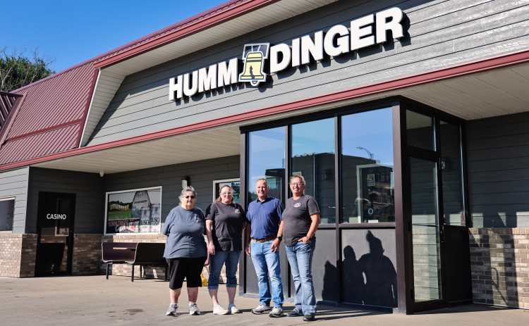 New Humm Dinger owner Cory Zacher, second from right, stands with members of the staff he credits with helping make his decision to purchase the Wessington Springs convenience store following the death of his brother, Jason. Pictured from left are Gerri Bader, Ellen Tobin, Zacher and Juli Jacobs. (KRISTI HINE / TRUE DAKOTAN)