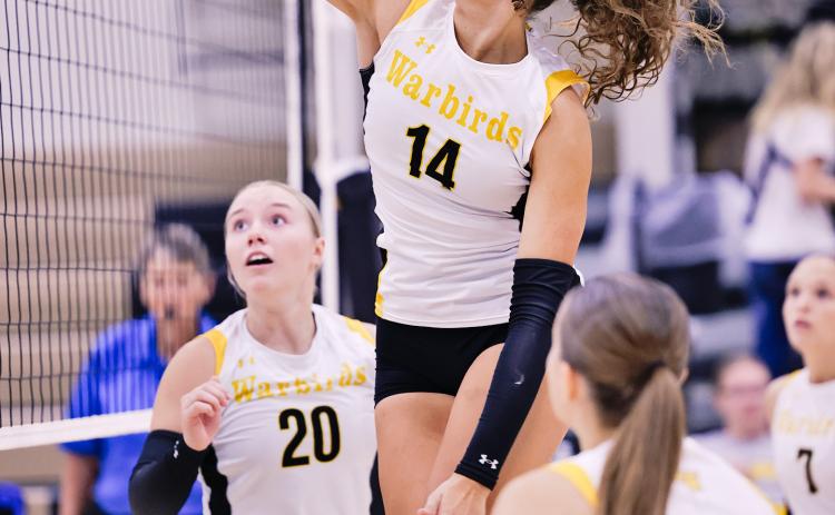 Preslie Jensen battles at the net during the Warbird Volleyball Tournament Saturday in Wolsey. Jensen recorded four kills and two blocks in Wolsey-Wessington’s 25-17, 25-19 win over Langford Area and added two blocks as the Lady Warbirds defeated Bridgewater-Emery 25-14, 25-19 to advance to the championship match.(KRISTI HINE / TRUE DAKOTAN)