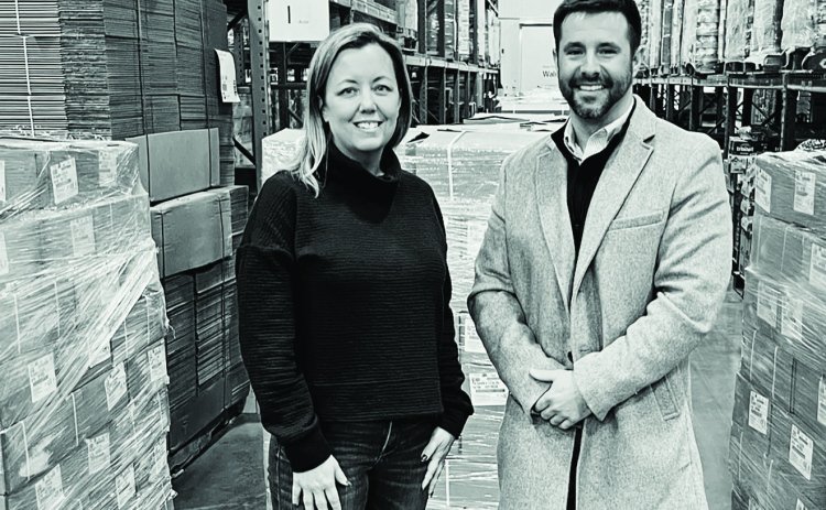 South Dakota Farmers Union partnered with Farmers Union Enterprises to donate 35,000 pounds of pork to Feeding South Dakota. Lori Dykstra, CEO FeedingSD and Luke Reindl, South Dakota Farmers Union. COURTESY PHOTO