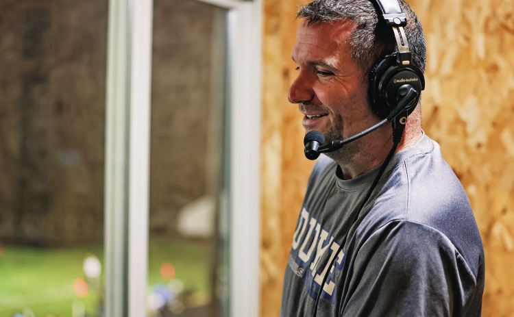 BEHIND THE MIC — Marcus Damm calls the action from the crow’s nest at Spartan Stadium during Wessington Springs’ Homecoming game Sept. 25. Damm was behind the mic as the WWSSC Bucks shut out Miller/Highmore-Harrold 32-0. (KRISTI HINE / TRUE DAKOTAN)