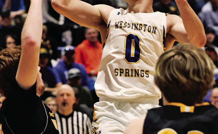 Karter Mebius soars to the hoop during Region 2B semifinal action Saturday, March 8, 2025 at the Dakota State University Fieldhouse in Madison, SD. The Spartans defeated the Warbirds 61-37, punching their ticket to SoDak 16. KRISTI HINE / TRUE DAKOTAN