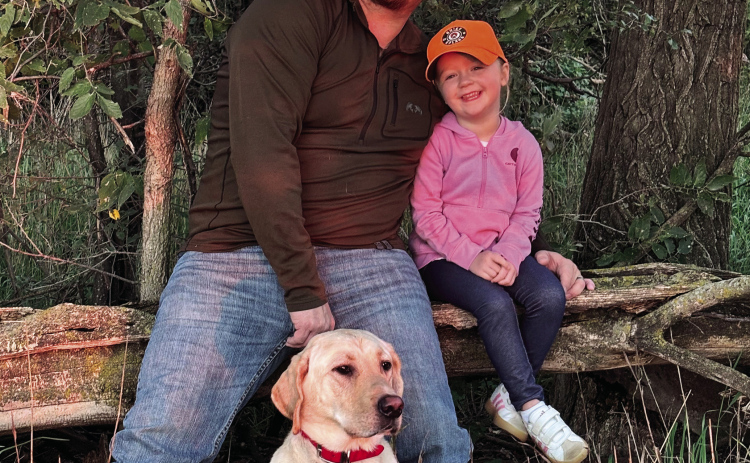 Wessington Springs Pheasants Forever Chapter President Paul Sheldon, daughter Brenley and hunting dog Guage. (PHOTO COURTESY SHELDON FAMILY)